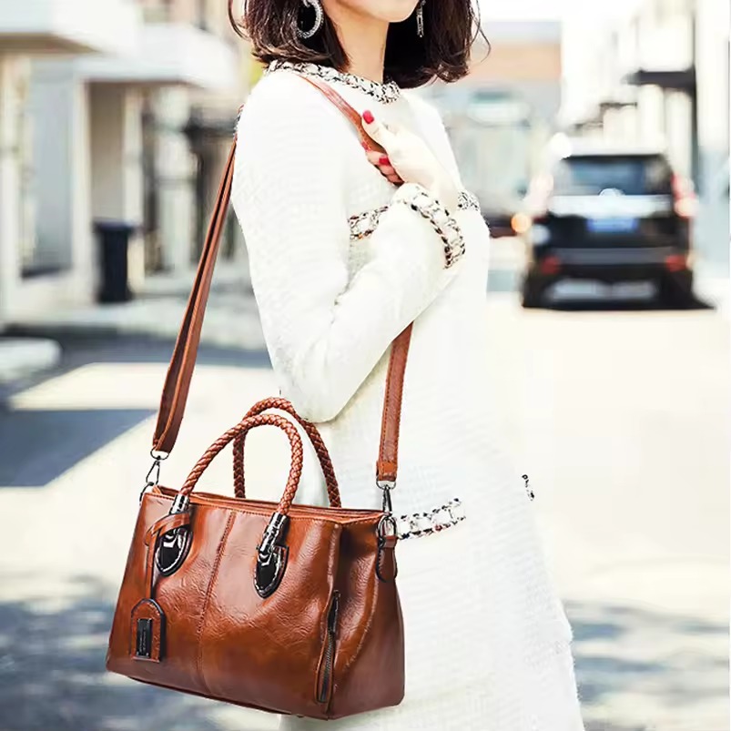 women with a handbag in street